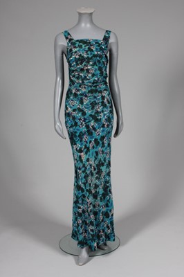 Lot 51 - A poor condition printed silk crepe evening...