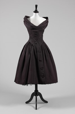 Lot 60 - A Dior black faille cocktail dress,...