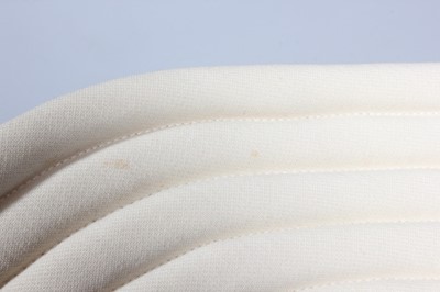 Lot 94 - A Pierre Cardin cream wool crepe 'circle'...