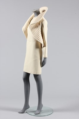 Lot 94 - A Pierre Cardin cream wool crepe 'circle'...