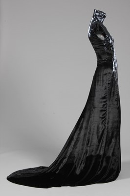 Lot 158 - An Alexander McQueen black velvet and bugle...