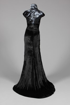 Lot 158 - An Alexander McQueen black velvet and bugle...