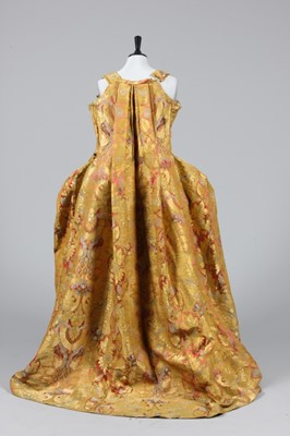 Lot 25 - The remains of a luxurious gold brocaded...