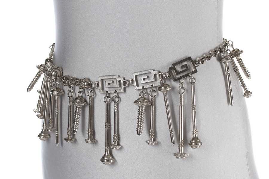 Lot 214 - A Versace 'Nuts and Bolts' metal chain belt,...
