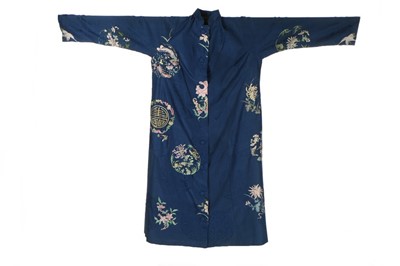 Lot 434 - An embroidered blue damask robe, Chinese,...