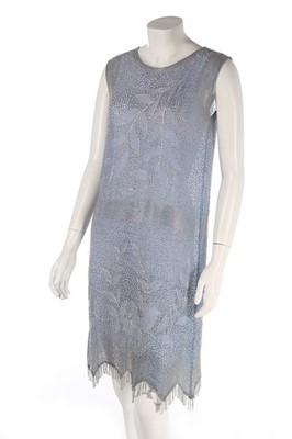 Lot 112 - A powder-blue beaded muslin flapper dress,...