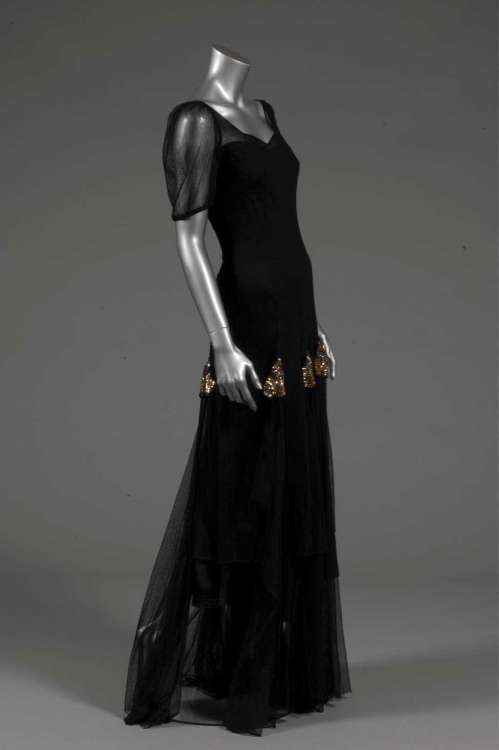 Lot 214 - A Thea Porter black tulle dress with sequined...