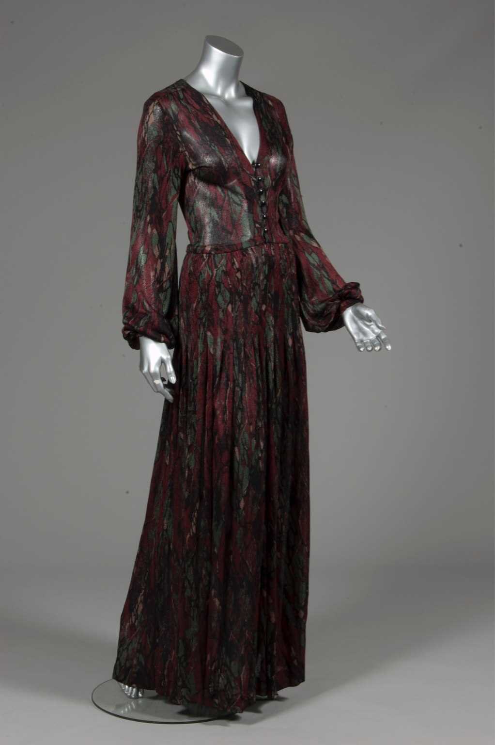 Lot 144 - An Yves Saint Laurent silk jersey evening gown,...