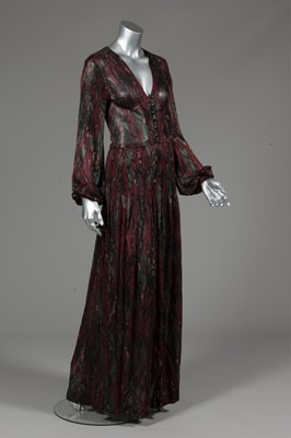 Lot 144 - An Yves Saint Laurent silk jersey evening gown,...