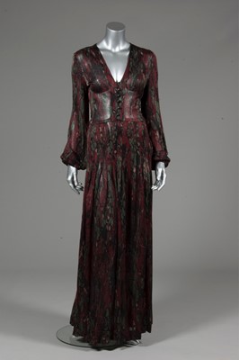 Lot 144 - An Yves Saint Laurent silk jersey evening gown,...