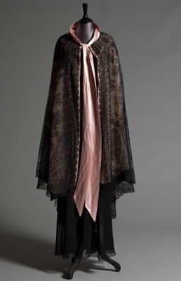 Lot 101 - A black bias-cut chiffon and Chantilly lace...