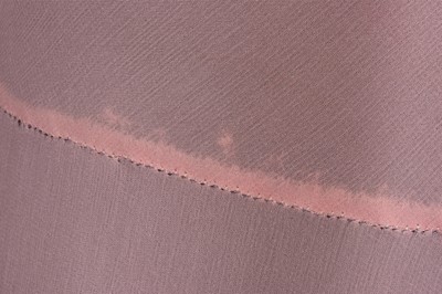 Lot 88 - A pale rose-pink chiffon and black Chantilly...