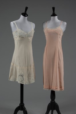 Lot 95 - Six petticoats, 1940s-50s, mainly silk and...