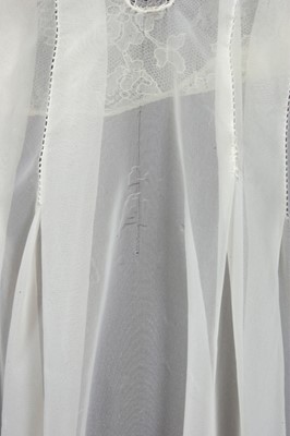 Lot 91 - An ivory chiffon nightdress, 1950s, with lace...