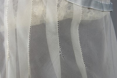 Lot 91 - An ivory chiffon nightdress, 1950s, with lace...