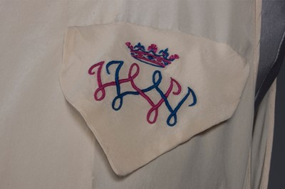 Lot 96 - An ivory crepe de chine nightdress embroidered...