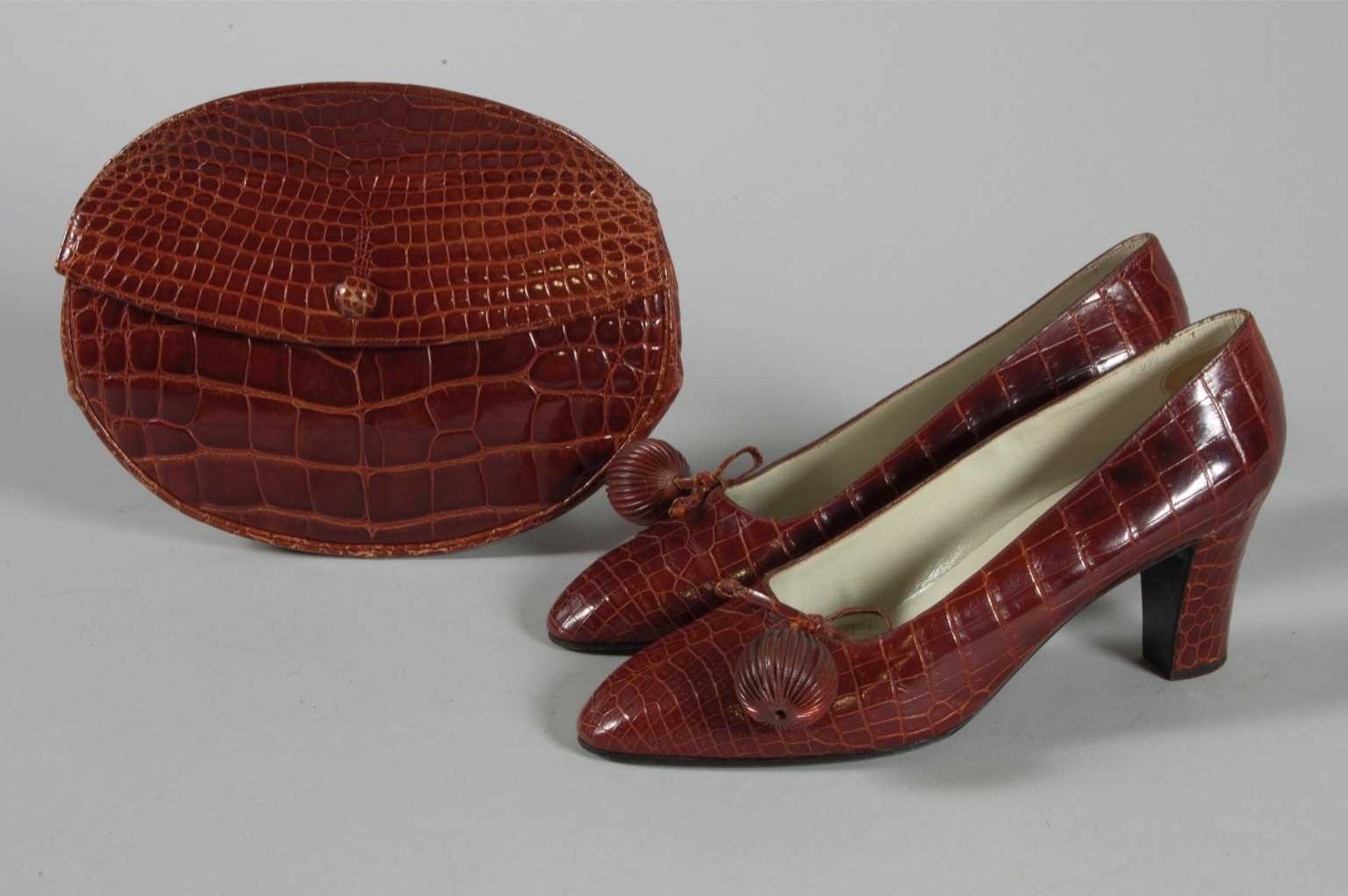 Lot 93 - A Roger Vivier melon shaped alligator pochette...