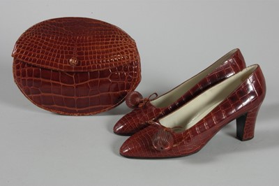 Lot 93 - A Roger Vivier melon shaped alligator pochette...