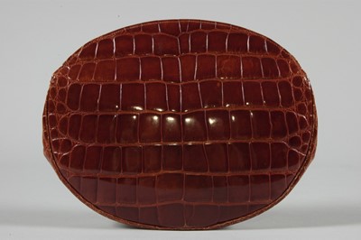 Lot 93 - A Roger Vivier melon shaped alligator pochette...