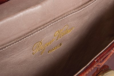 Lot 93 - A Roger Vivier melon shaped alligator pochette...