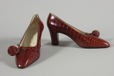 Lot 93 - A Roger Vivier melon shaped alligator pochette...