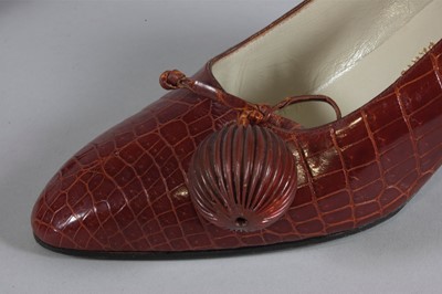 Lot 93 - A Roger Vivier melon shaped alligator pochette...