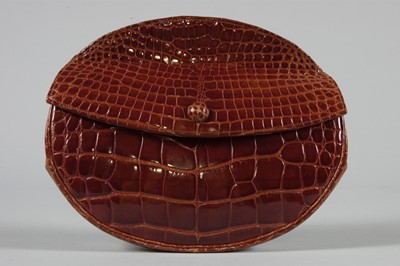 Lot 93 - A Roger Vivier melon shaped alligator pochette...