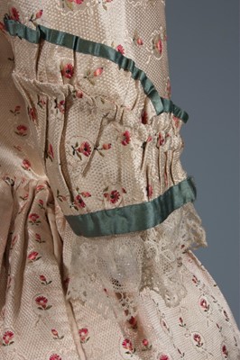 Lot 45 - A brocaded silk open robe 'à la polonaise',...