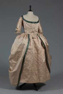Lot 45 - A brocaded silk open robe 'à la polonaise',...