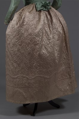 Lot 45 - A brocaded silk open robe 'à la polonaise',...