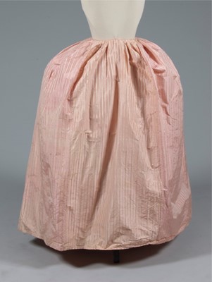 Lot 49 - A quilted ivory silk petticoat, circa 1760-80,...