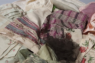 Lot 49 - A quilted ivory silk petticoat, circa 1760-80,...