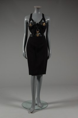 Lot 260 - A Versace black `bondage' cocktail dress,...
