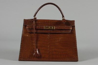 Lot 10 - An Hermès brown crocodile Kelly bag, circa...