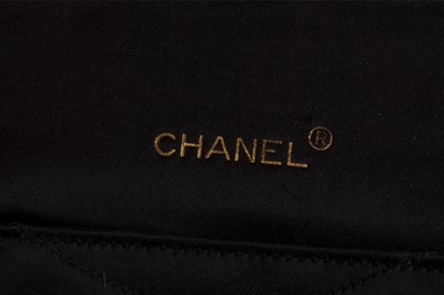 Lot 9 - A Chanel quilted satin evening bag, 1980s,...