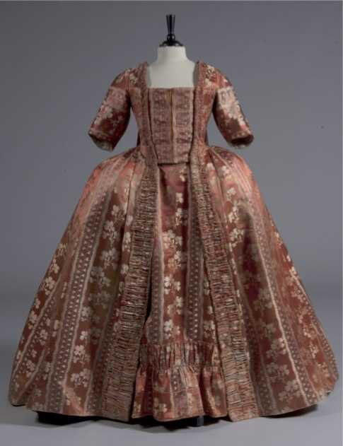 Lot 42 - A brocaded cinnamon satin robe à la française,...