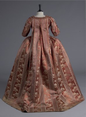 Lot 42 - A brocaded cinnamon satin robe à la française,...
