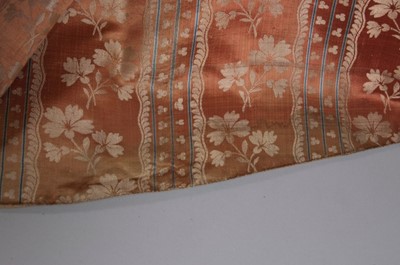 Lot 42 - A brocaded cinnamon satin robe à la française,...