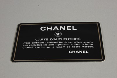 Lot 6 - A Chanel quilted black jersey 2.55 bag, 1980s,...