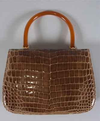 Lot 8 - A Gucci cafau lait crocodile handbag, 1960s,...