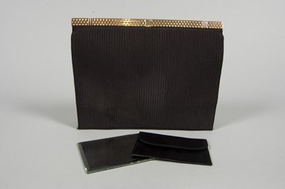 Lot 16 - A Cartier gold mounted black silk grosgrain...
