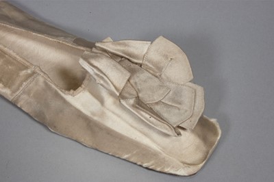 Lot 56 - An ivory silk bridal gown, circa 1838, with...