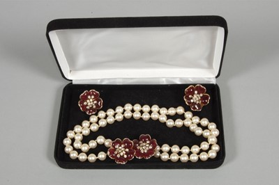 Lot 14 - A faux pearl double strand necklace and...