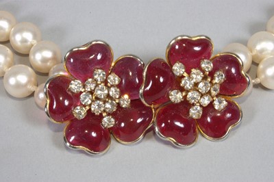 Lot 14 - A faux pearl double strand necklace and...