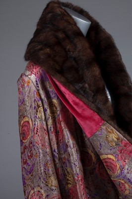 Lot 74 - An opera coat, late 1920s, of printed floral...