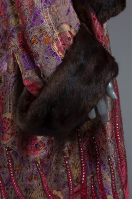 Lot 74 - An opera coat, late 1920s, of printed floral...