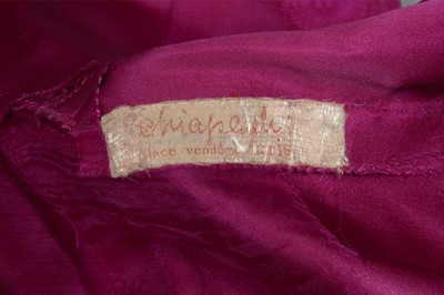 Lot 84 - A rare Schiaparelli shocking pink satin...