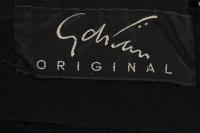 Lot 124 - A Gilbert Adrian beaded black wool crepe...