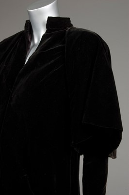 Lot 81 - A Balenciaga couture black velvet redingote,...
