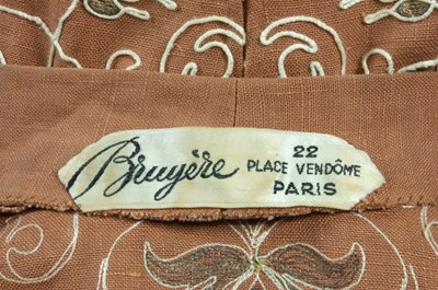 Lot 126 - A Bruyre couture embroidered linen ensemble,...